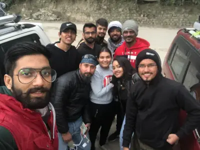North East Travel Group beside SUV car